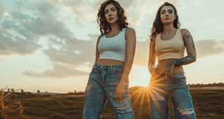 Two women in popular distressed jeans