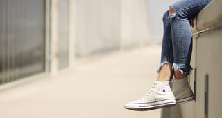 Girl in distressed jeans